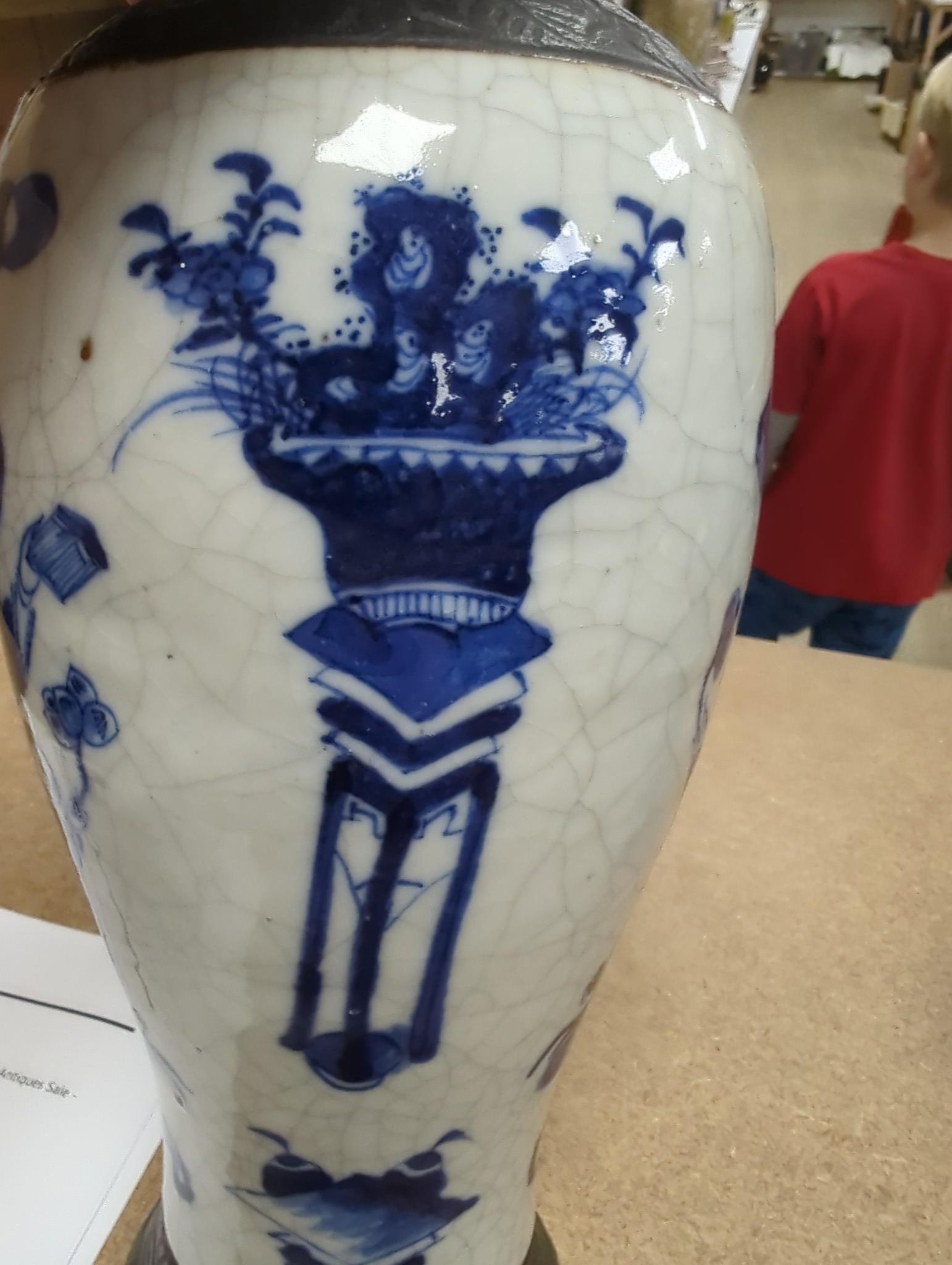 Three Chinese blue and white crackle glaze vases, a famille rose brush pot, late 19th/early 20th century, a crackle glaze ginger jar and a carved soapstone lion-dog (6)